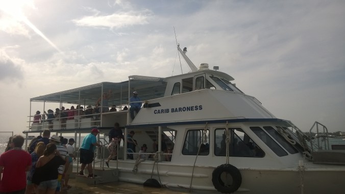 A Tender boat at the pier of Grand Cayman waiting to return to the Disney Fantasy