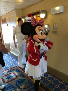 Minnie Mouse greeting people