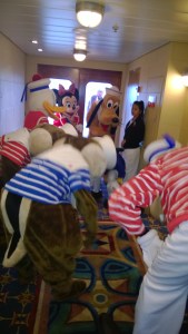 Disney characters getting warmed up for the Sail Away party on the Disney Wonder.
